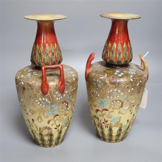 A pair of Doulton Lambeth Slaters patent vases, height 27cm